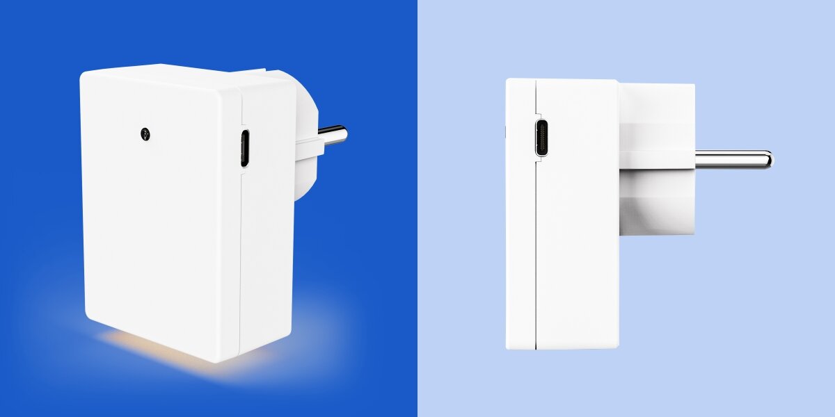 Lampka nocna HAMA 223506 z czujnikiem zmierzchu Widok z boku ładowarki Hama z widocznym portem USB-C oraz prezentacja delikatnego podświetlenia dolnego o ciepłej barwie.