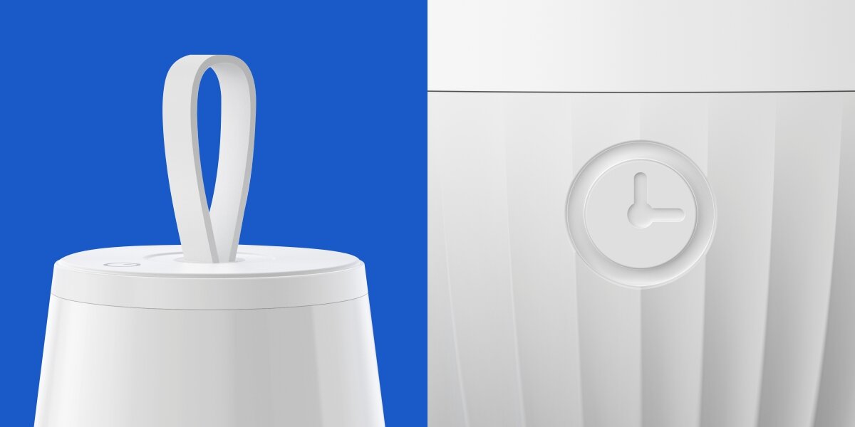 Lampka nocna HAMA Mobile Zbliżenie na detale białej lampki LED: elastyczny pasek do przenoszenia oraz dotykowy przycisk z ikoną zegara na karbowanej obudowie.