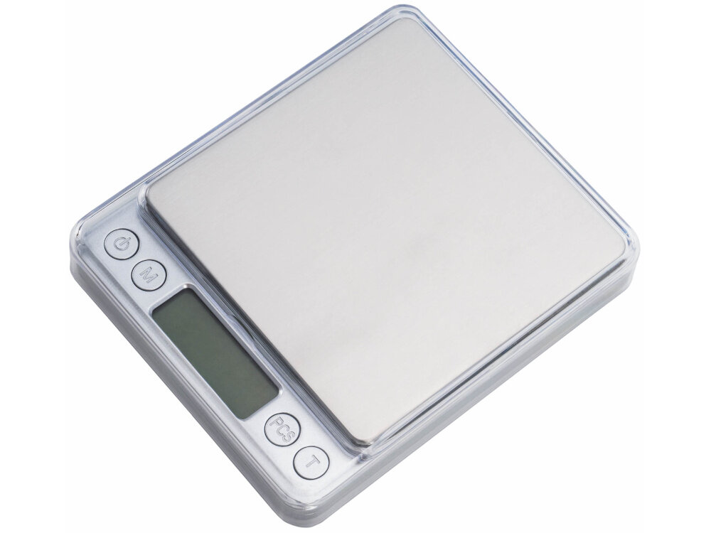Na zdjęciu znajduje się srebrna waga jubilerska z wyświetlaczem LCD i trzema przyciskami funkcyjnymi. Obudowa jest przezroczysta, a powierzchnia ważąca jest metaliczna.