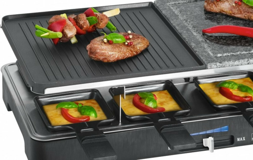 Grill elektryczny CLATRONIC RG 3518 parametry fizyczne moc 1400 W waga 4,85kg wydajny system grillowania system malych patelni