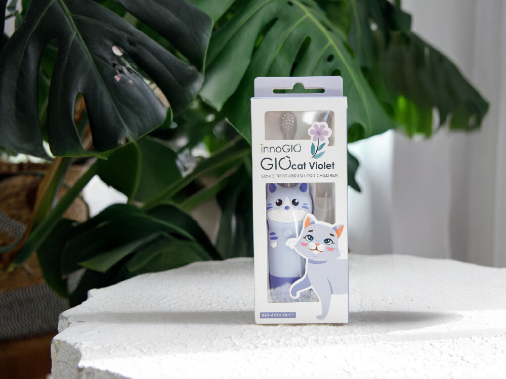 Szczoteczka soniczna fioletowy kotek miękkie włosie i zaokrąglone krawędzie łatwo utrzymać szczoteczkę w dłoni