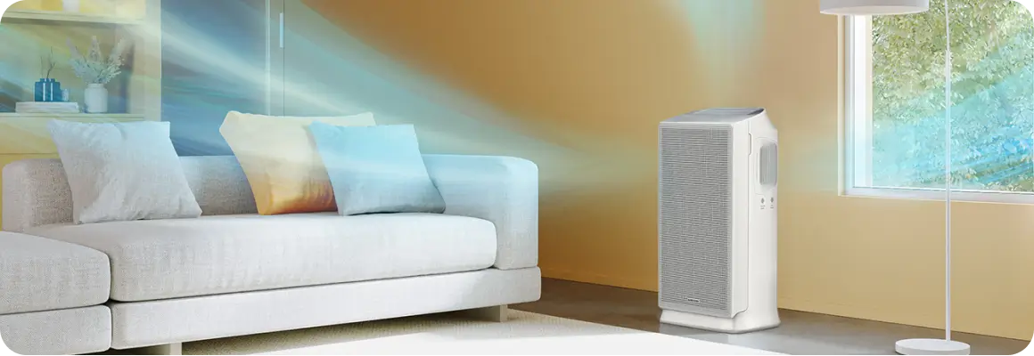 Oczyszczacz powietrza w nowoczesnym salonie, wydmuchujący czyste powietrze w trzech kierunkach.