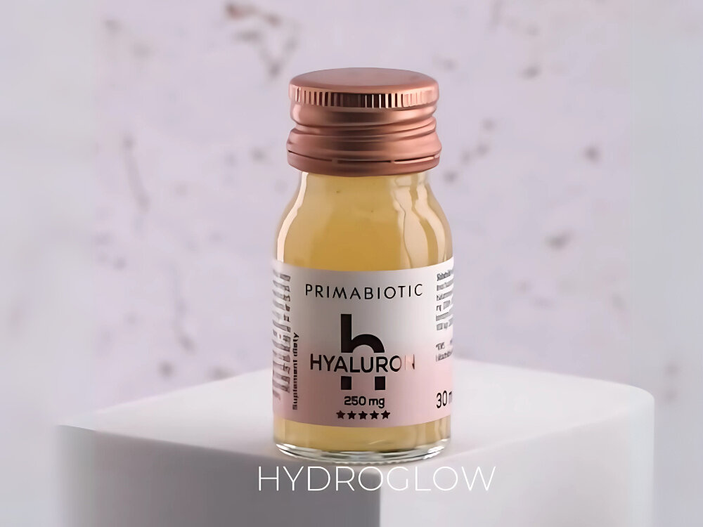 Kwas hialuronowy PRIMABIOTIC Mango 30 x 30 ml buteleczka na postumencie szare tło koenzym Q10 ubichinon wspiera procesy regeneracji komórkowej poprawia ich metabolizm witalność i promienny wygląd zawartość koenzymu Q10 20 mg odnowa komórkowa