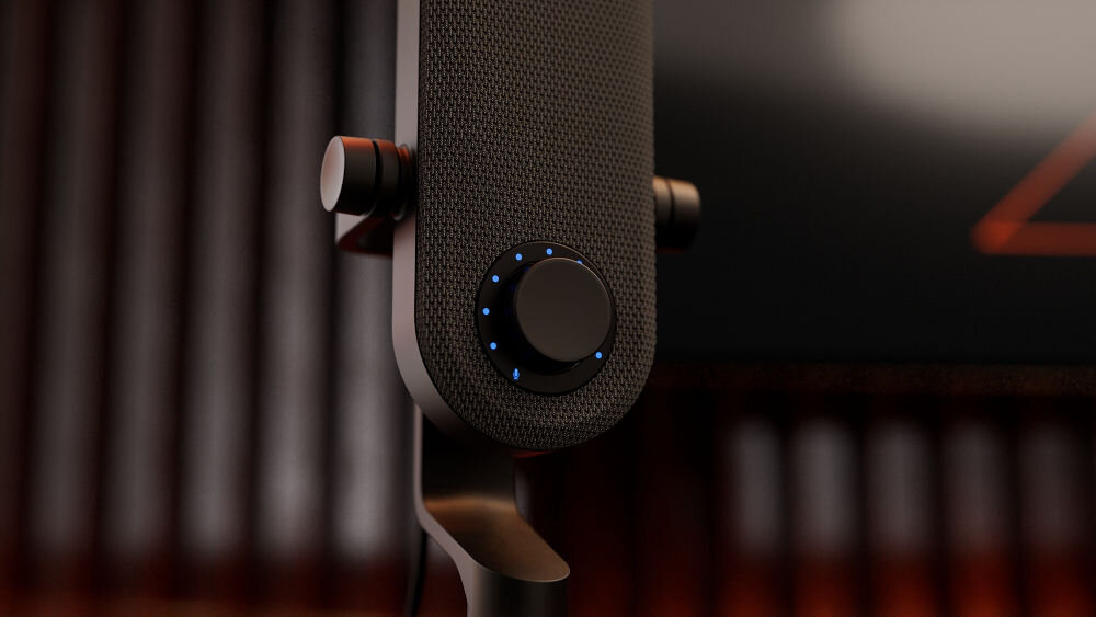 Mikrofon KRUX Pin KRXC018 Kardioidalny Czarny Bardzo bliskie ujęcie centralnego pokrętła mikrofonu KRUX Pin, z wyraźnie widocznymi niebieskimi diodami LED oraz ikonami słuchawek i mikrofonu wygodne pokrętło na obudowie dostosowanie dźwięku do sytuacji wysoka jakość swoboda twórcza