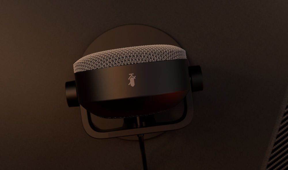 Mikrofon KRUX Pin KRXC018 Kardioidalny Czarny Górna część mikrofonu KRUX Pin ukazująca siatkowaną powierzchnię i dotykowy przycisk wyciszania z ikoną mikrofonu. dotykowy przycisk wyciszenie urządzenia w ułamku sekundy jedno dotknięcie aktywacja trybu mute sygnalizowana czerwonym podświetleniem