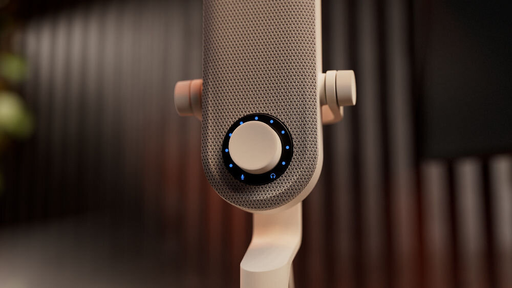 Mikrofon KRUX Pin KRXC019 Kardioidalny Biały Zbliżenie na biały mikrofon KRUX Pin, ukazujące centralne pokrętło z niebieskimi diodami LED i ikonami słuchawek i mikrofonu funkcja regulacji balansu odsłuchu decydujesz o proporcjach dźwięku wielofunkcyjne pokrętło