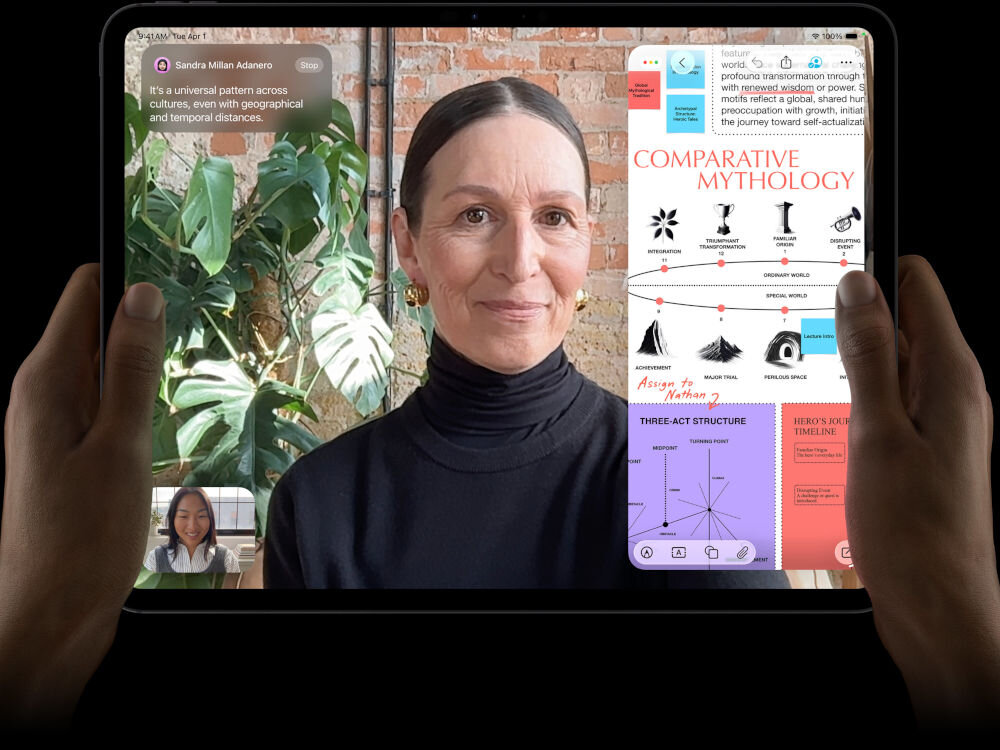Tablet APPLE iPad Pro trzymany w rękach na ekranie wideokonferencja o okienko z prezentacją