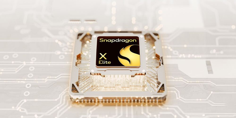 Procesor Snapdragon X z czerwonym logo NPU na płycie głównej laptopa ASUS Zenbook z widocznymi ścieżkami przewodzącymi i układami scalonymi do przetwarzania AI - Snapdragon X z dedykowanym układem NPU