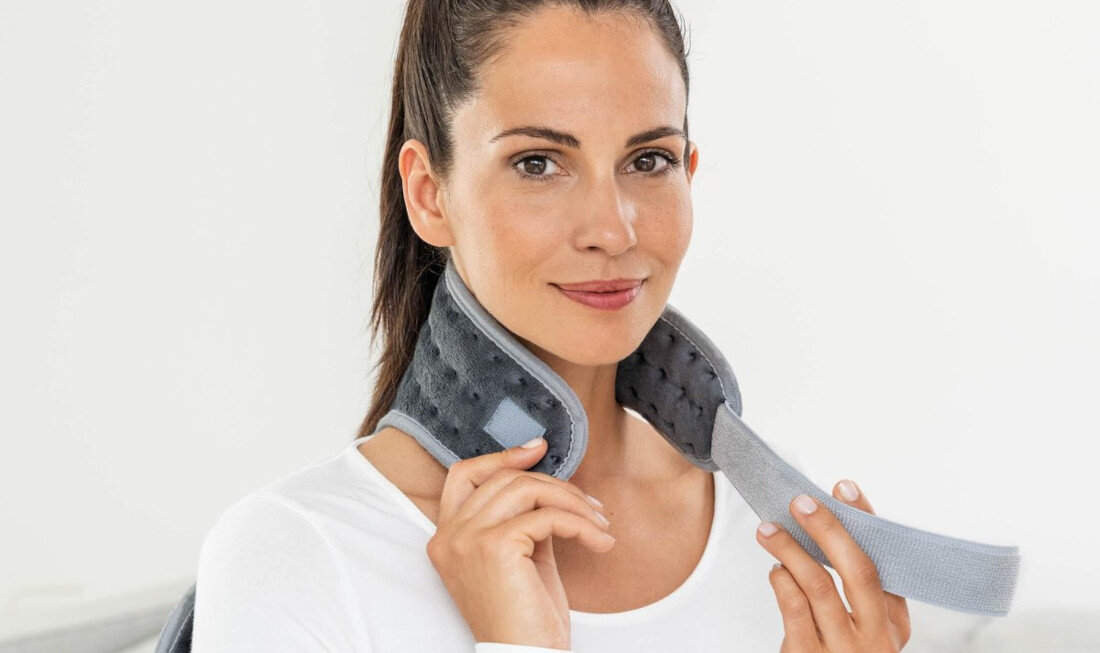 Poduszka elektryczna BEURER HK 64 Regulowany pas i miękkie zapięcie na rzep Stonowany odcień szarości i minimalistyczne wzornictwo