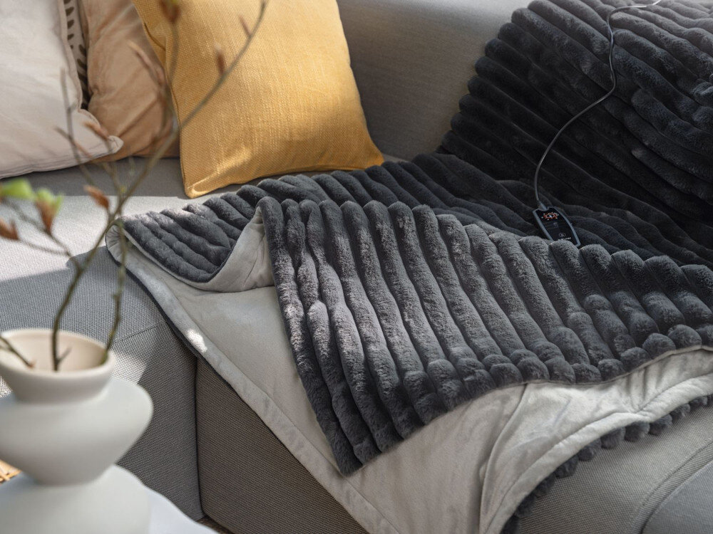 Koc elektryczny BEURER HD 82 Stockholm Przyjemne chwile relaksu Superdelikatna tkanina przyjazna dla skóry uczucie przytulności Lekka struktura materiału