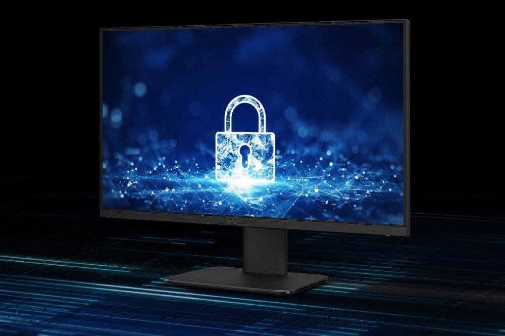 Komputer All in One ASUS ExpertCenter P440VAK-BPCA90X Czarny komputer stacjonarny ukazany pod kątem na ciemnym tle, z wyświetloną na ekranie grafiką cyfrowej sieci z dużą, jasną ikoną kłódki na środku, zabezpieczenia, moduł TPM, gniazdo Kensington