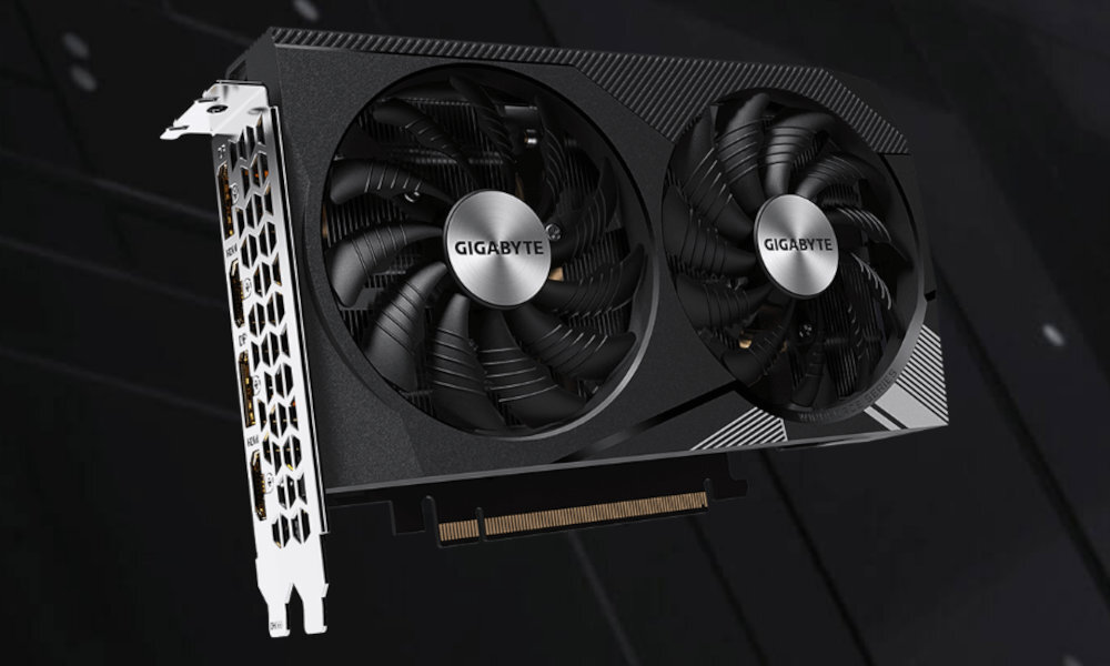 Na obrazie widoczna jest karta graficzna z dwoma dużymi wentylatorami, na których znajduje się logo \'GIGABYTE\'. Karta ma metalowy panel z otworami wentylacyjnymi.