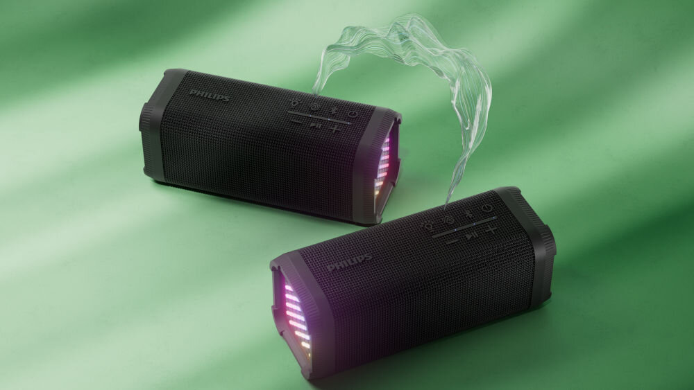 PHILIPS TAS2000B/00 głośnik Bluetooth 5.4, Multipoint, odtwarzanie z USB-A, dwa głośnikiki mobilne po skosie na zielonym tle