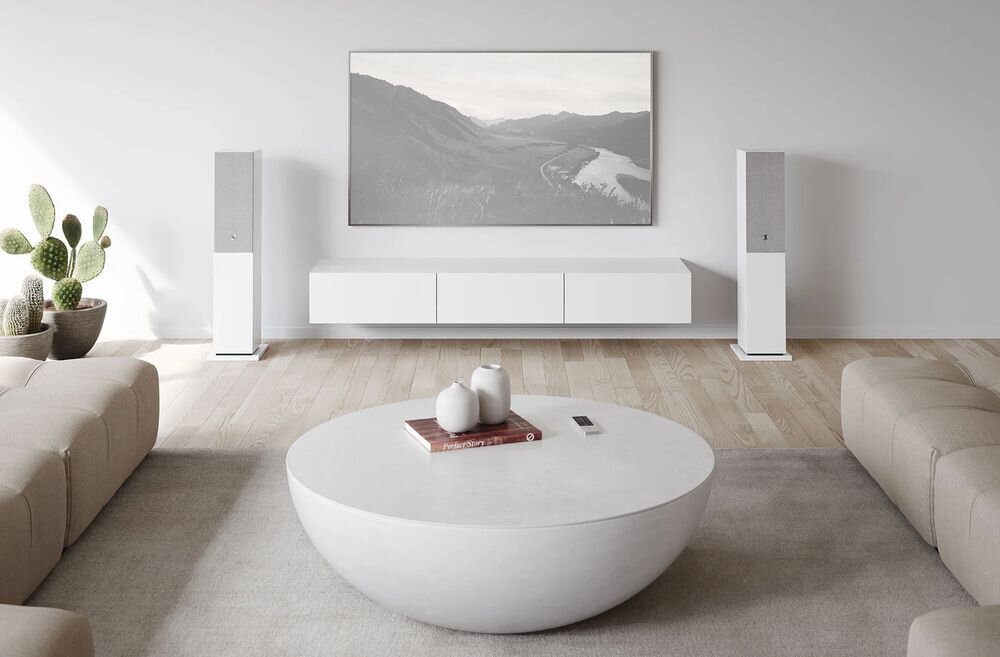 Audio Pro A48 W aktywny zestaw głośników stereo z czystym dźwiękiem i wysoką jakością, kolumny stojące po obu stronach komody w pomieszczeniu