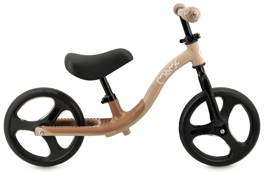 Rowerek biegowy MOMI Isoka Beżowy rowerek na białym tle widoczny z boku lekka rama o masie 3,2 kg swobodne prowadzenie stalowa 9,5-calowa konstrukcja trwałość stabilność ramy wspiera rozwój równowagi