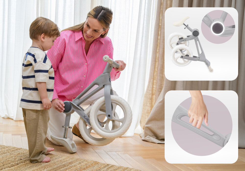 Rowerek biegowy MOMI Noru Szary pokój osoba trzyma w dłoniach złożony rowerek obok stoi dziecko obok dwa zdjecia ze zbliżeniem na złożony rowerek i uchwyt nauka równowagi koordynacji świadomego kontrolowania ruchu przygotowuje malucha do późniejszej jazdy na klasycznym rowerze rozwija motorykę aktywność na świeżym powietrzu lekka konstrukcja