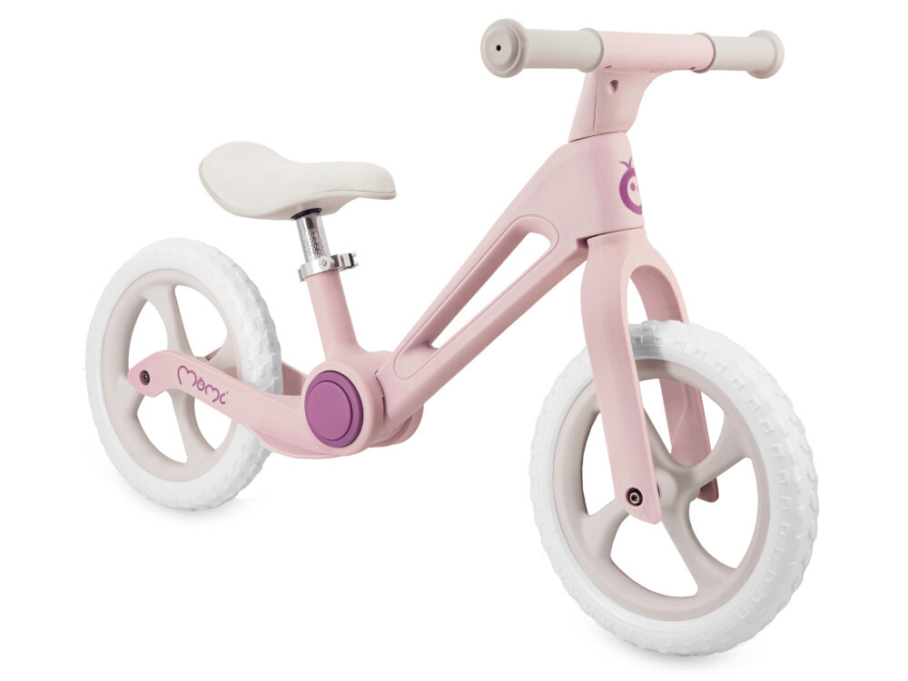 Rowerek biegowy MOMI Noru Różowy rowerek na białym tle widoczny od przodu pod skosem nauka równowagi koordynacji świadomego kontrolowania ruchu przygotowuje malucha do późniejszej jazdy na klasycznym rowerze rozwija motorykę aktywność na świeżym powietrzu lekka konstrukcja