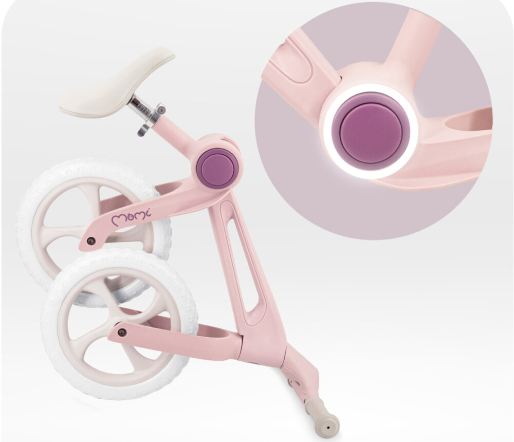 Rowerek biegowy MOMI Noru Różowy złożony rowerek na jasnym tle obok zdjęcie ze zbliżeniem na przycisk do złożenia składany mechanizm ramy szybkie złożenie przy użyciu jednego przycisku ułatwia przechowywanie prosty system składania