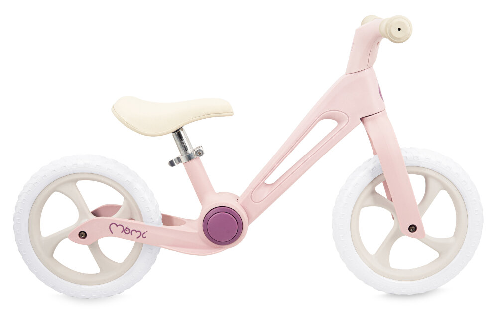 Rowerek biegowy MOMI Noru Różowy rowerek na białym tle widoczny z boku spełnia europejskie normy EN 71-1, EN 71-2 i EN 71-3 bezpieczeństwo zastosowanych materiałów i konstrukcji odpowiedni dla dzieci od 2. roku życia do maksymalnej wagi do 25 kg pojazd został sprawdzony pod kątem użytkowania