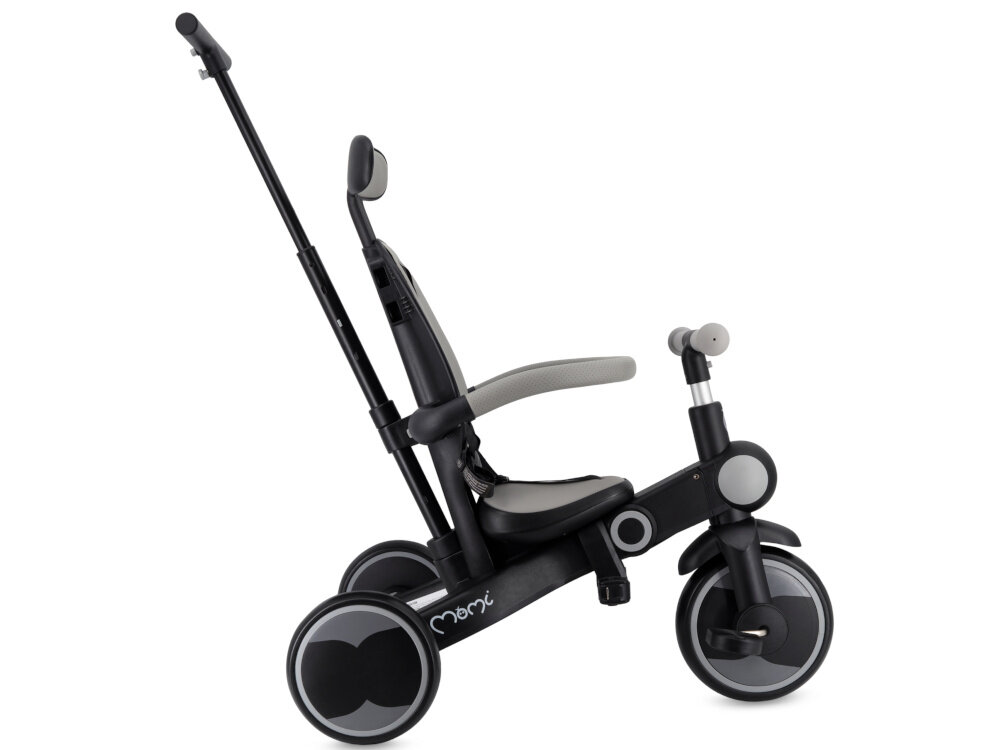 Rowerek trójkołowy MOMI Solivia 4w1 Opony Eva Szary rączka rowerek na białym tle widoczny z boku teleskopowy uchwyt dla rodzica trzystopniowa regulacja w zakresie 87/92/97 cm funkcja wolnego koła rodzicowi pełna kontrola nad kierunkiem jazdy