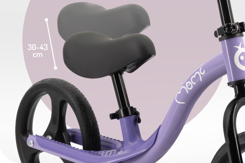 Rowerek biegowy MOMI Isoka Fioletowy zbliżenie na siodełko widoczna regulacja miękkie regulowane siedzisko o zakresie 30–43 cm można dopasować wysokość do wzrostu dziecka prosta regulacja prawidłowa postawa lepsze panowanie nad rowerkiem