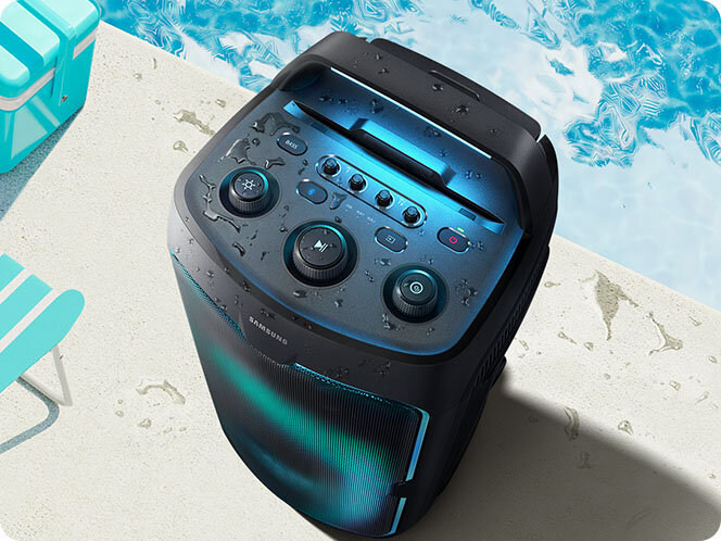 664x498 splashproof Sound Tower ST50F placed next to outdoor pool. It functions despite water having splashed onto it.