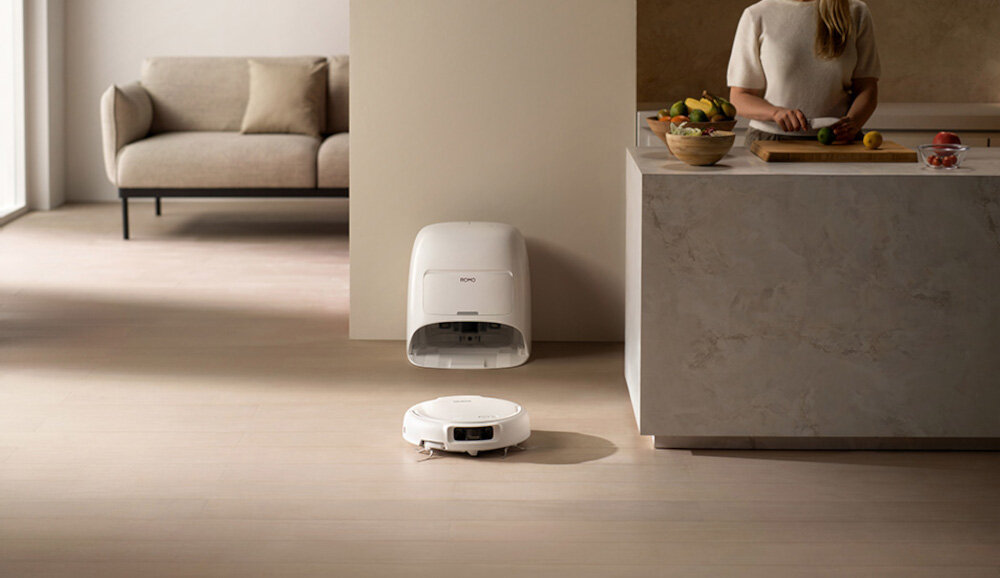 Robot sprzątający DJI Romo S Płynne planowanie tras martwe punkty, pracuje bez zakłóceń w pobliżu ciemnych przedmiotów i pod meblami sprząta blisko kabli, nóg stołów i listew przypodłogowych wraca do stacji