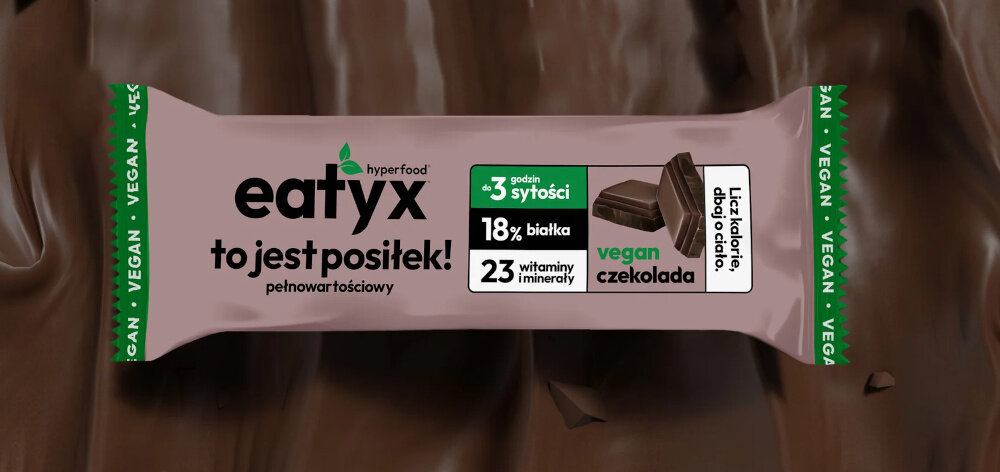 Baton proteinowy EATYX Hyperfood Czekoladowy (8 x 60 g) czekoladowe tło baton na tle posiłek pełnowartościowy baton