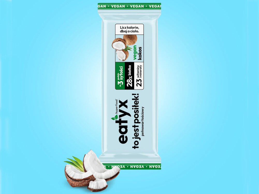 Baton proteinowy EATYX Hyperfood Kokosowy (8 x 60 g) baton na niebieskim tle obok kokos formuła wegańska nie zawiera glutenu laktozy barwników i konserwantów kokosowy profil smakowy stała forma sytość do 3 godzin