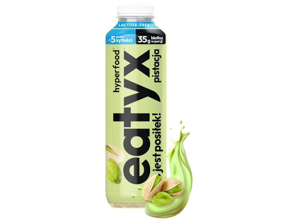 Posiłek w płynie EATYX Hyperfood Pistacjowy (500 ml) butelka posiłku na białym tle obok leżą pistacje w płynnej formie pełnowartościowa porcja składników odżywczych o smaku pistacjowym kompletny posiłek w butelce o pojemności 500 ml, gotowy do spożycia od razu po otwarciu