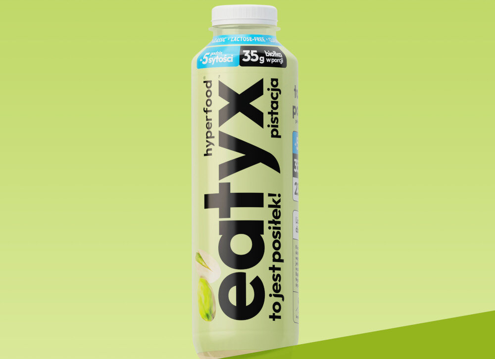 Posiłek w płynie EATYX Hyperfood Pistacjowy (500 ml) butelka posiłku na zielonym tle około 35 g białka w porcji 505 kcal dla osób dbających o bilans energetyczny inulina naturalny prebiotyk wsparcie układu pokarmowego pomaga w utrzymaniu prawidłowej wagi źródło naturalnego błonnika