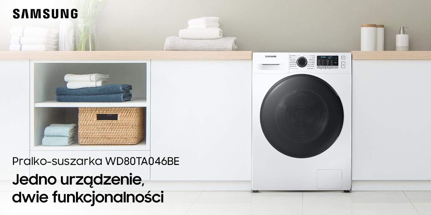 W łazience znajduje się pralko - suszarka a obok na szafkach są ręczniki  W łazience znajduje się pralko - suszarka a obok na szafkach są ręczniki