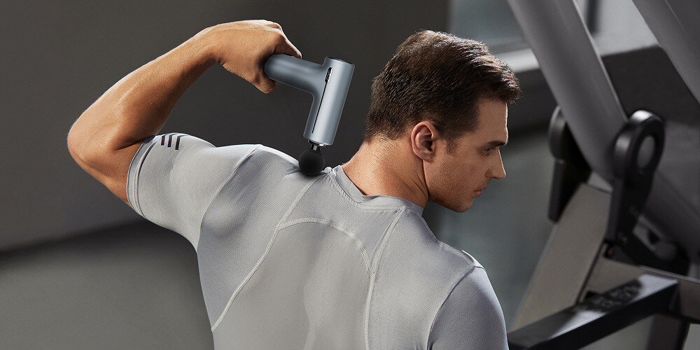 Masażer ręczny Gun SKG F1 Pro Wbudowany akumulator pojemność system zabezpieczeń stabilna praca możliwści podróż na kilka sesji