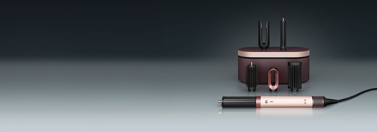 Zbliżenie na zestaw Dyson Airwrap Coanda2x z sześcioma końcówkami do włosów naturalnie prostych i falowanych.