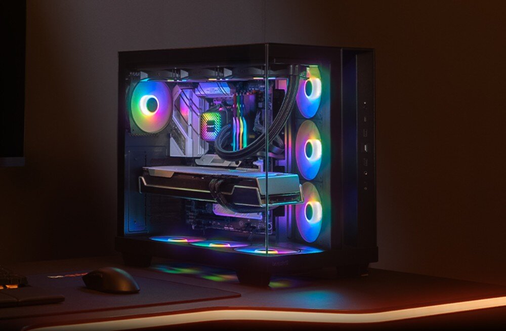 Obudowa BE QUIET! Light Base 500 LX Wnętrze komputera w obudowie z przezroczystym panelem bocznym, podświetlone wielokolorowym światłem RGB, z widocznymi wentylatorami, kartą graficzną i chłodzeniem cieczą zamontowanym na górze obudowy, opis