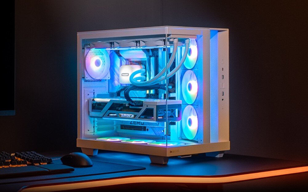 Obudowa BE QUIET! Light Base 500 LX Wnętrze komputera w obudowie z przezroczystym panelem bocznym, podświetlone wielokolorowym światłem RGB, z widocznymi wentylatorami, kartą graficzną i chłodzeniem cieczą zamontowanym na górze obudowy, opis