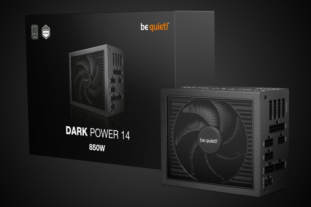 Zasilacz BE QUIET Dark Power 14 Zasilacz komputerowy stojący obok swojego opakowania z widocznym napisem 'Dark Power 14 1000W' i logo producenta na czarnym tle, opis