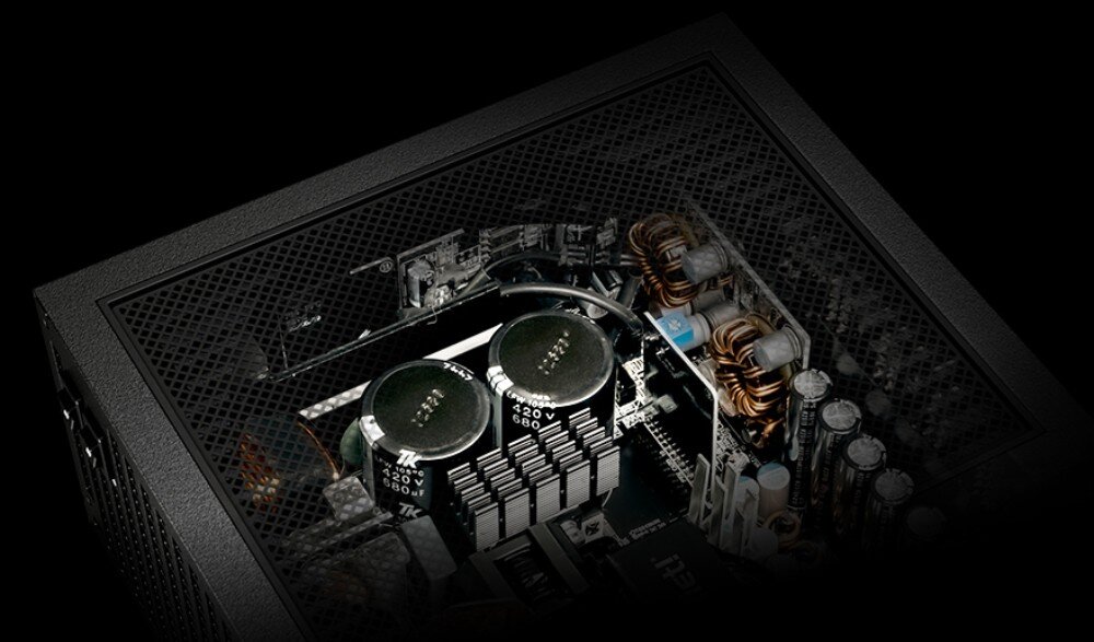 Zasilacz BE QUIET Dark Power 14 Wnętrze zasilacza widoczne przez perforowaną obudowę, z pokazanymi kondensatorami, radiatorami i elementami elektronicznymi, moc, cechy, przeznaczenie