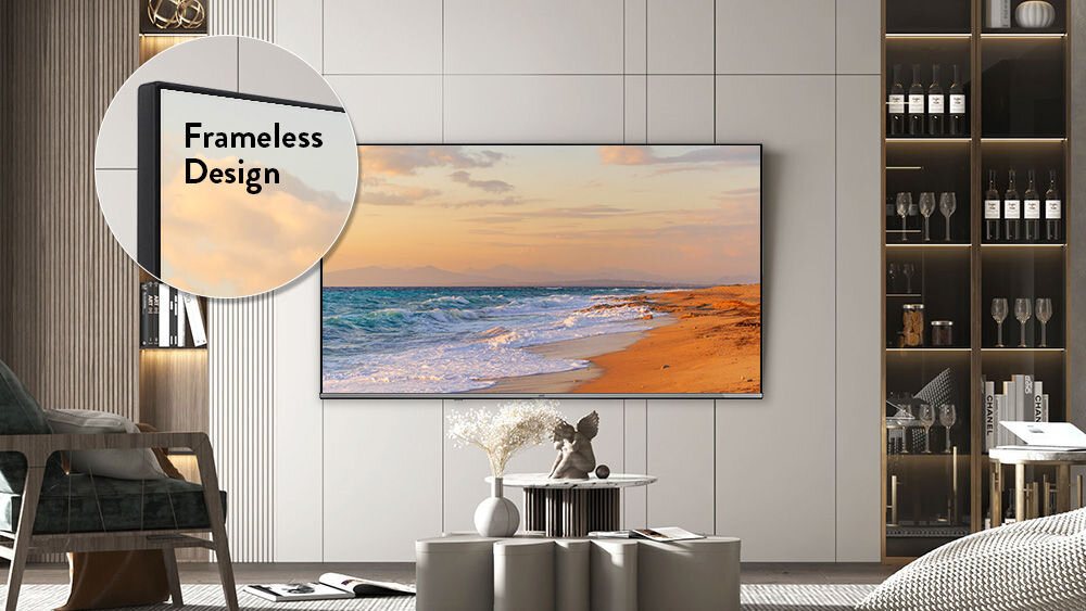 Telewizor JVC LT-55VGQ750P bezramkowy design metalowa obudowa estetyka, telewizor wiszący na ścianie w pomieszczeniu