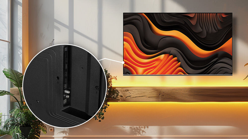 Telewizor JVC LT-65VG7500 wygodne podłączenia gniazda bok komfort użytkowania, telewizor zawieszony na ścianie w pomieszczeniu