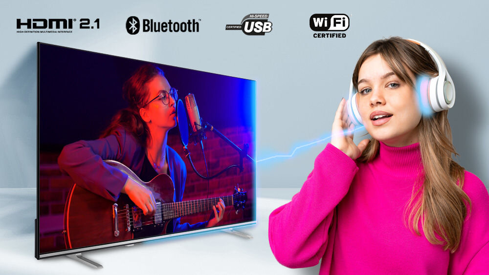 Telewizor JVC LT-43VG7500 HDMI USB Bluetooth WiFi podłączanie urządzeń komfort, osoba z założonymi słuchawkami nausznymi