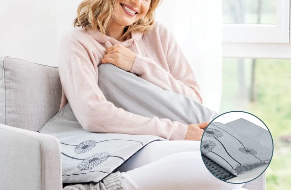 Poduszka elektryczna BEURER HK 125 Cosy Na różne pory roku podczas pracy przy biurku, jak i w czasie wieczornego odpoczynku ciepło  praktyczne wsparcie