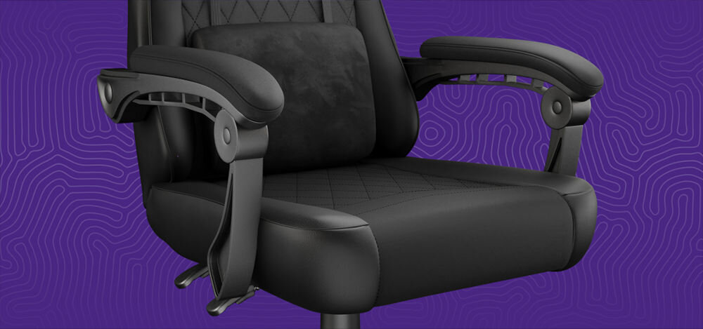 Fotel FURY Shinai S2 Czarny zbliżenie na siedzisko fotela na fioletowym tle z geometrycznymi kształtami wysoka odporność tkaniny wysokiej klasy dokładne wykończenie gamingowy charakter