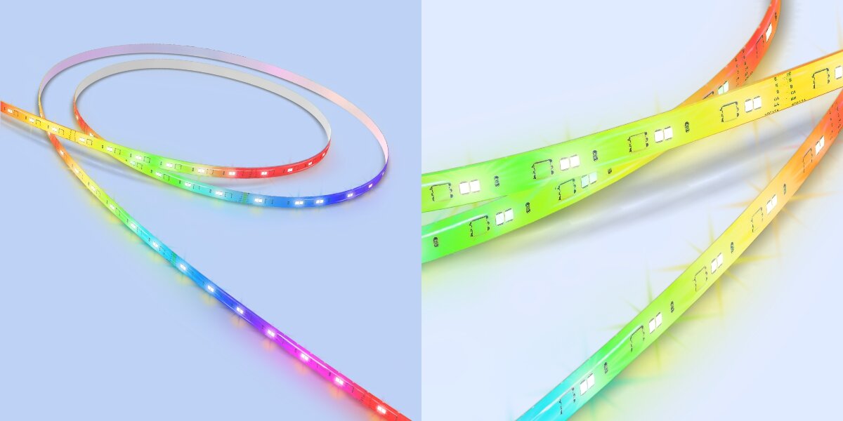 Obraz przedstawia taśmę LED emitującą światło w różnych kolorach, takich jak niebieski, zielony, żółty i czerwony. Taśma jest rozwinięta i widoczne są na niej diody LED.