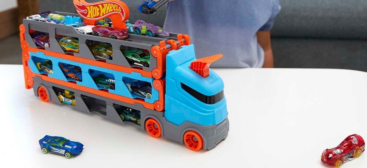 Samochód HOT WHEELS Transporter Wyścigowy 2w1 GVG37 wyścigi ciężarówka z naczepą transporter przyspieszacz metalowe samochody pojazdy kabina transformacja miejsce 25 pojazdów rajd przechowywane wystawianie hotweels prezent na urodziny mały metalowy samochodzik chłopcy dziewczynki kreatywność do łączenia łączy się rywalizacja zestaw do zabawy zabawka dla chłopca chłopięce zabawki metalowy mattel GVG37 wyścigowy transporter