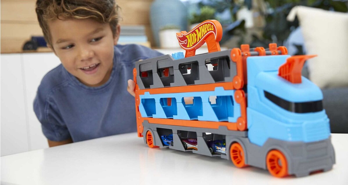 Samochód HOT WHEELS Transporter Wyścigowy 2w1 GVG37 wyścigi ciężarówka z naczepą transporter przyspieszacz metalowe samochody pojazdy kabina transformacja miejsce 25 pojazdów rajd przechowywane wystawianie hotweels prezent na urodziny mały metalowy samochodzik chłopcy dziewczynki kreatywność do łączenia łączy się rywalizacja zestaw do zabawy zabawka dla chłopca chłopięce zabawki metalowy mattel GVG37 wyścigowy transporter