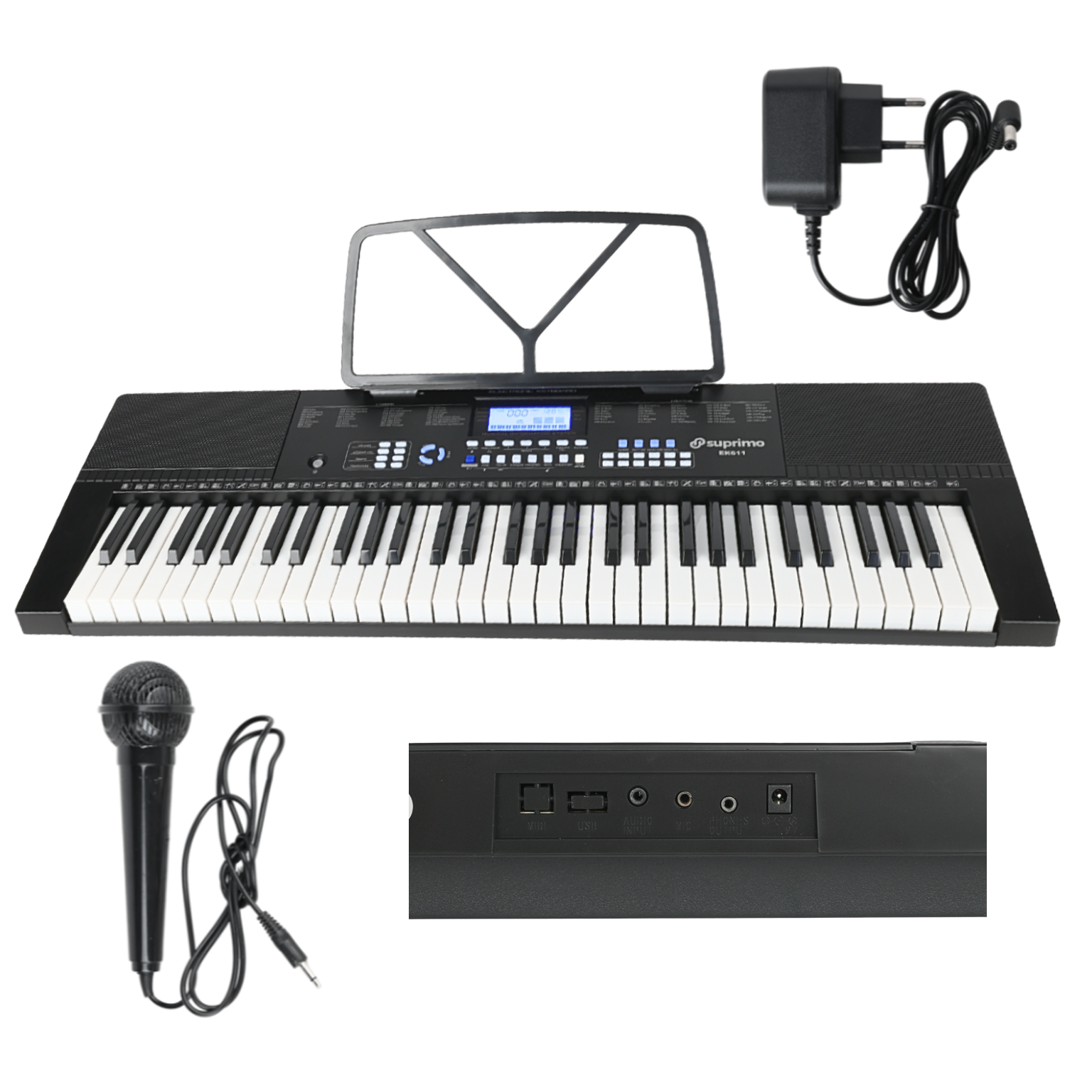 Na obrazie znajduje się elektroniczny keyboard z 61 klawiszami, pulpitem do nut oraz przewodowym mikrofonem. Widoczny jest również zasilacz i panel z różnymi portami, a na keyboardzie znajduje się logo \'suprimo\'.