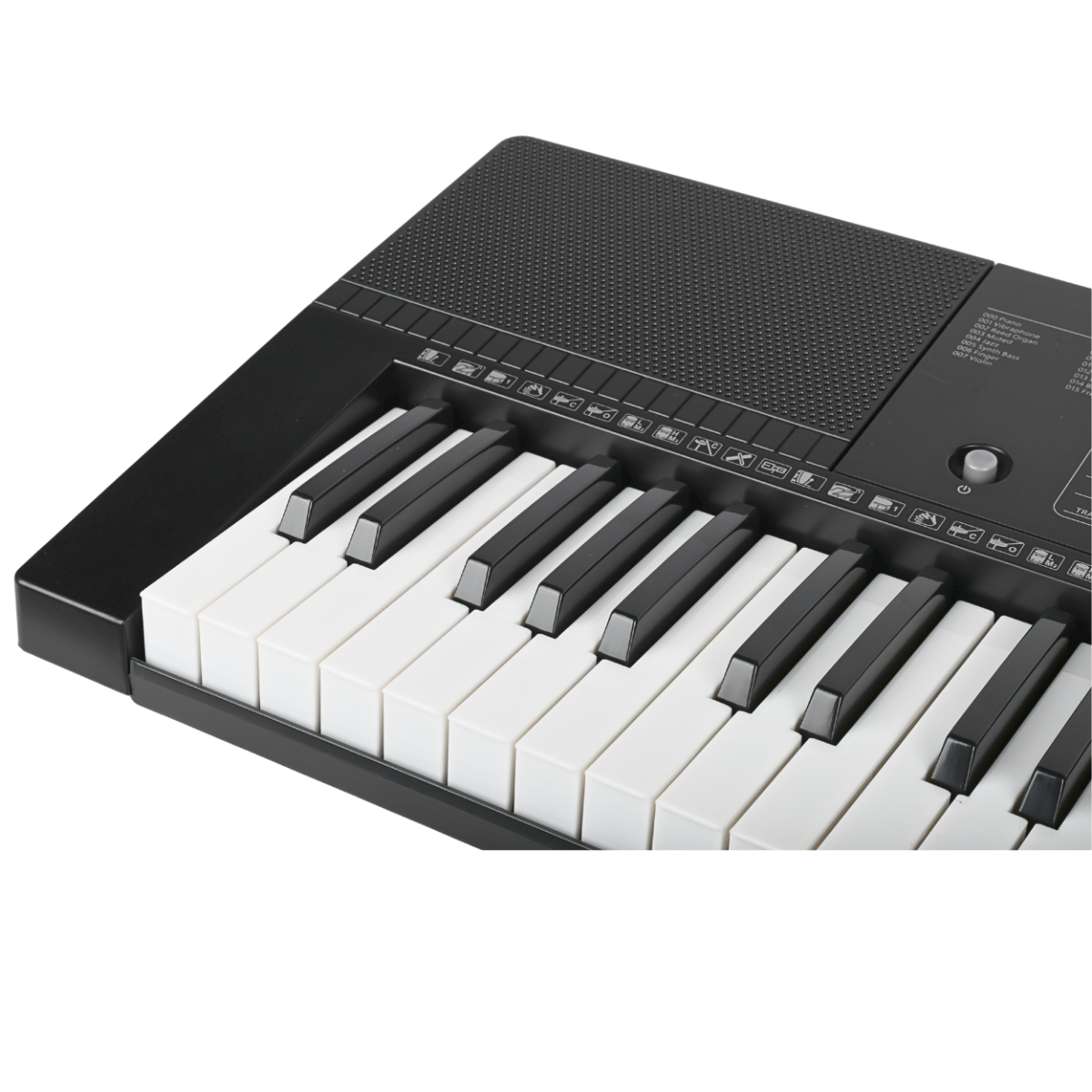 Fragment elektronicznego keyboardu z widocznymi białymi i czarnymi klawiszami oraz panelem z przyciskami funkcyjnymi i głośnikiem.