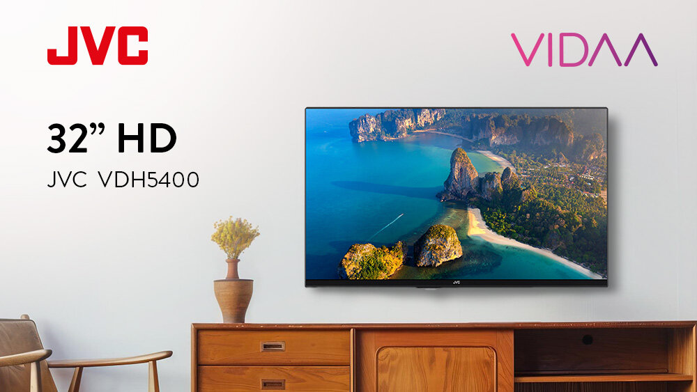 Telewizor JVC LT-32VDH5400 - Telewizor z systemem VIDAA, telewizor zawieszony na ścianie nad komodą