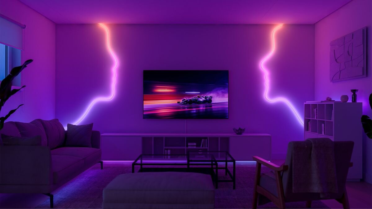 Taśma LED PHILIPS HUE Essential Neon Flex 929004295101 5 m Bluetooth, Kolory, paleta, nastrój, barwy, Salon z telewizorem i neonowymi profilami twarzy na ścianie.